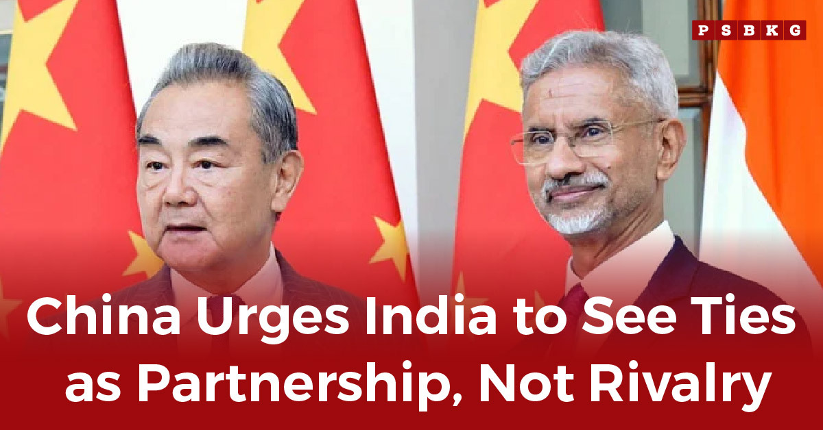 Two officials stand side by side with Chinese and Indian flags in the background, symbolizing a growing China India partnership and diplomatic ties.