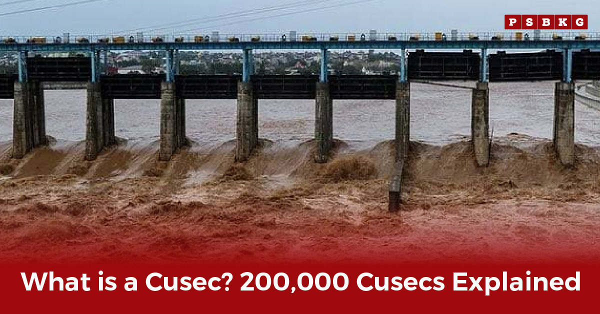 A large water discharge structure with flowing brown water beneath, representing flood control, water management, and the massive flow measured in cusec of water.