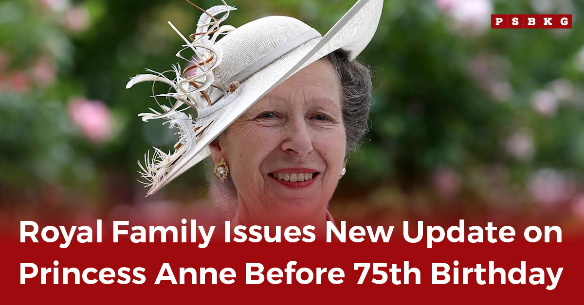 Princess Anne new portrait: A woman wearing an elegant hat adorned with feathers and flowers stands against a blurred garden background, evoking a royal update.