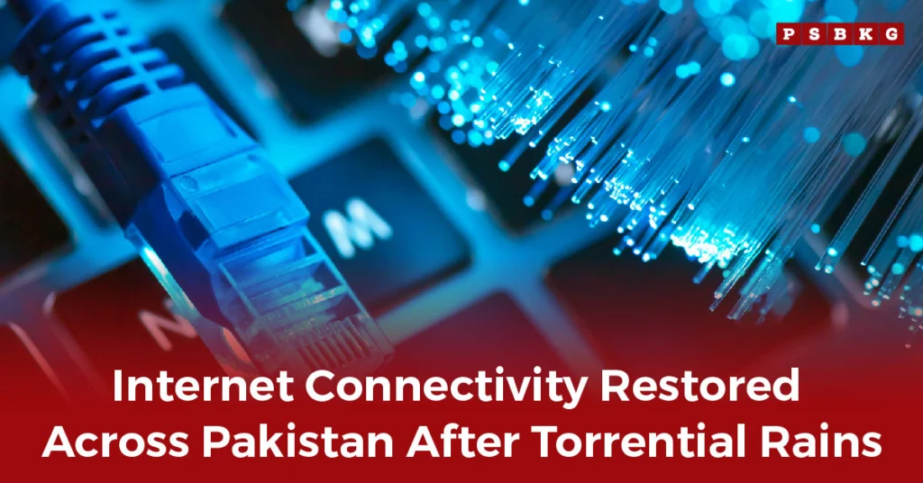 A close-up of a blue ethernet cable plugged into a keyboard with fiber optic lights, symbolizing restored internet connectivity in Pakistan.