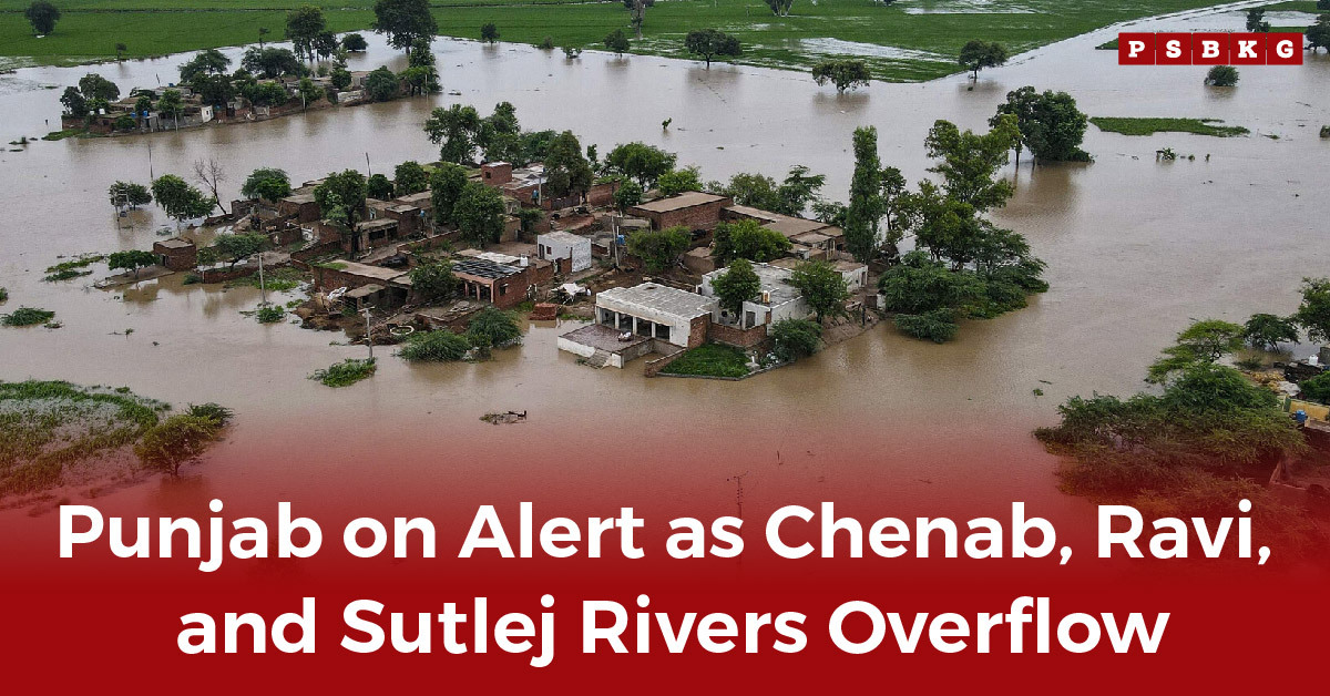 An aerial view of flooded houses surrounded by water in Punjab, showing the Chenab Ravi Sutlej overflow and the destruction caused by rising rivers.