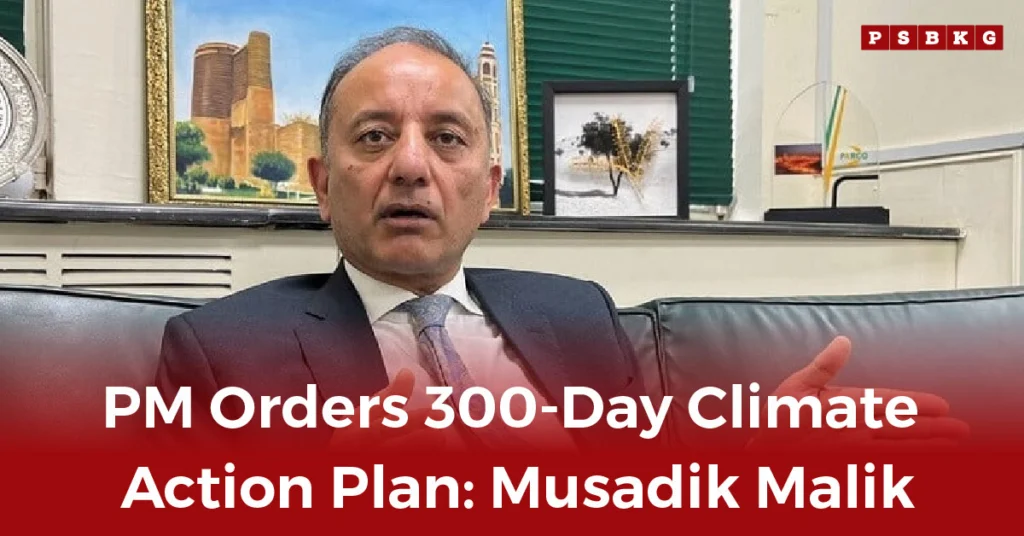 300-day climate action plan A man in a suit gestures while seated, discussing climate strategies, with framed artwork and a decorative plate behind him.