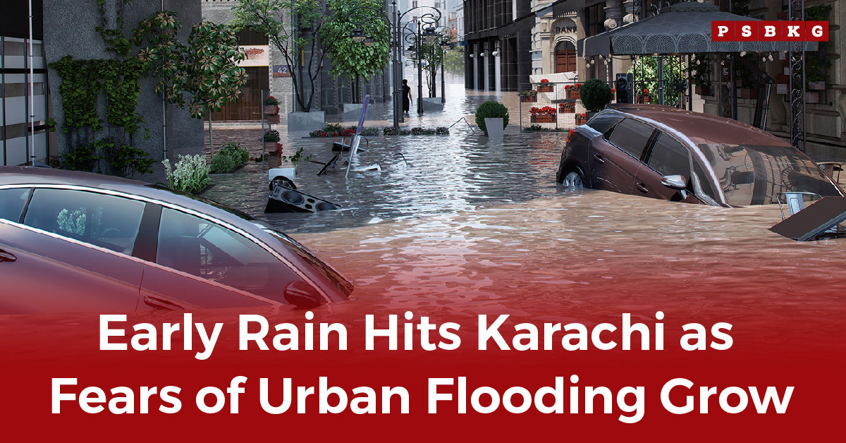 A flooded street in Karachi with parked cars partially submerged as early rain hits Karachi, raising concerns about urban flooding across the city. Early rain hits Karachi.
