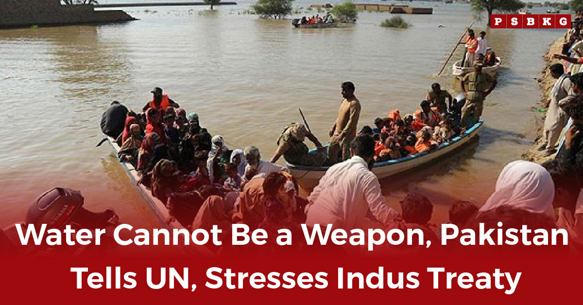 A crowded boat navigates through floodwaters as people seek rescue, highlighting the Pakistan UN water statement on protecting water rights.