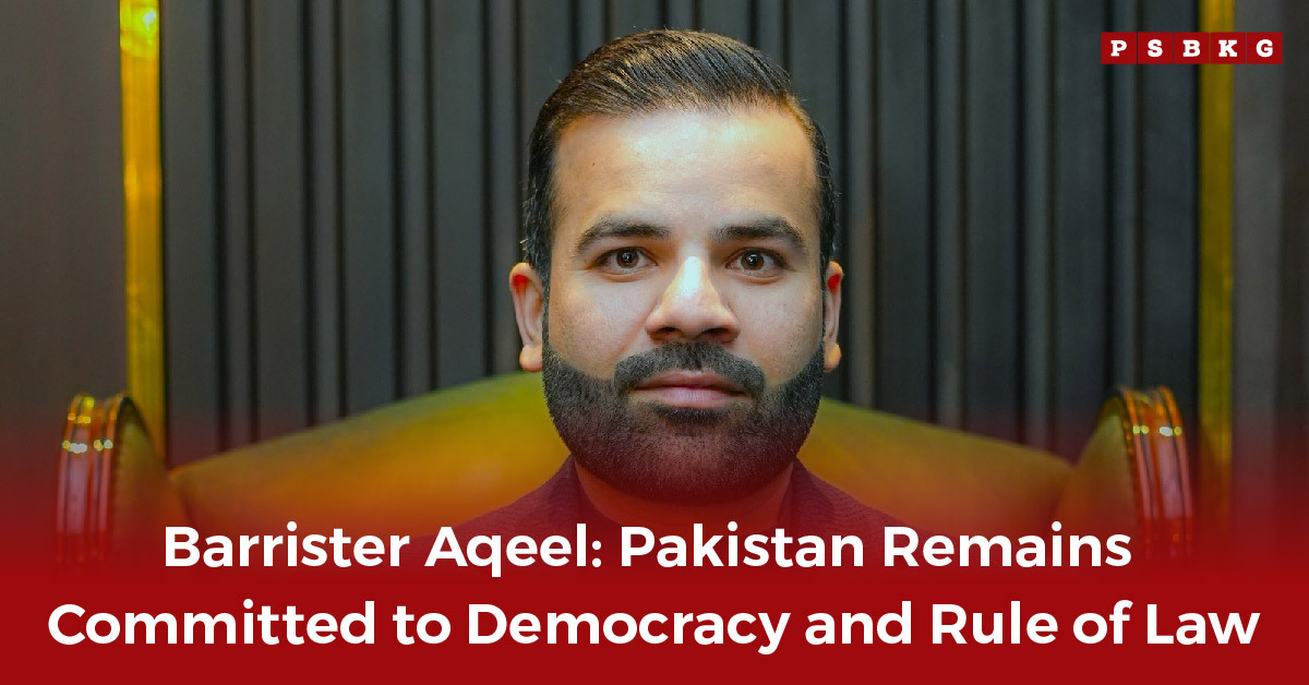 A man in formal attire sits against a sophisticated backdrop, symbolizing Pakistan democracy commitment and the nation’s focus on rule of law. Pakistan democracy commitment