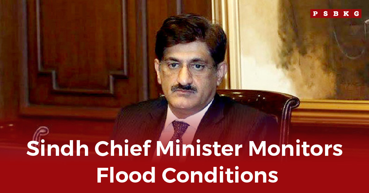 Sindh Chief Minister oversees flood response efforts in a formal setting with wooden paneling and artwork, highlighting the Sindh flood situation.