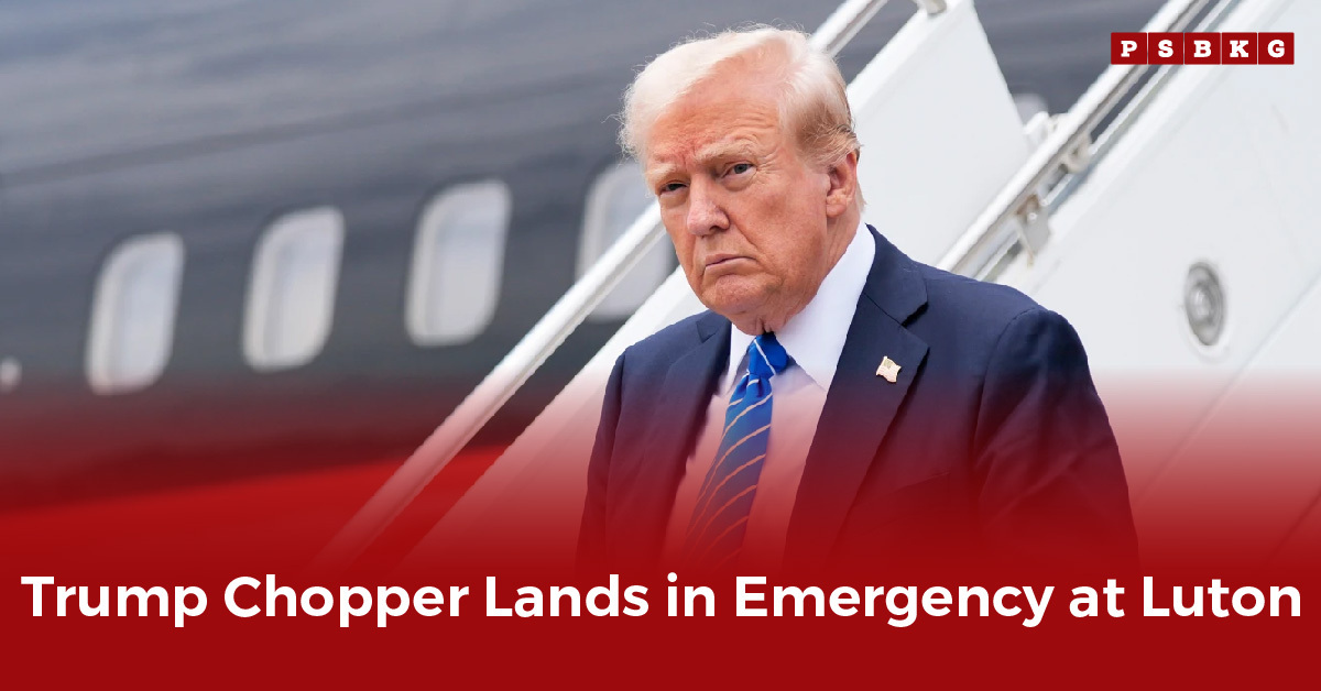 A man in a suit with a blue tie descends from a helicopter at Luton Airport, with blurred aircraft in the background, highlighting Trump Luton landing.