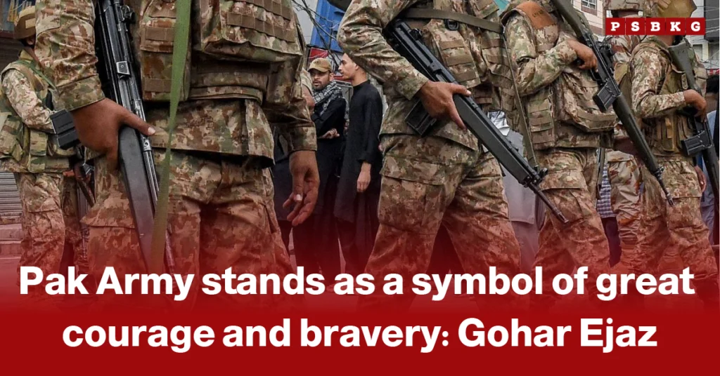 A line of Pakistan Army soldiers in camouflage uniforms holding rifles, representing courage, discipline, and national bravery during a public ceremony.