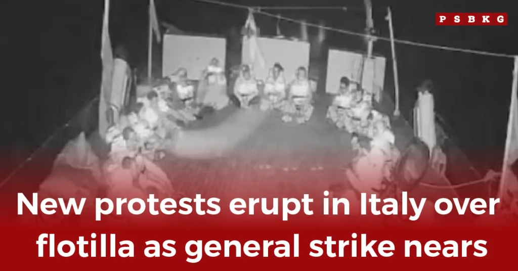 Protesters gather in Italy at night, raising awareness before a general strike over Pakistanis seized Gaza flotilla issue.