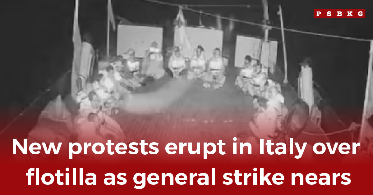 Protesters gather in Italy at night, raising awareness before a general strike over Pakistanis seized Gaza flotilla issue.