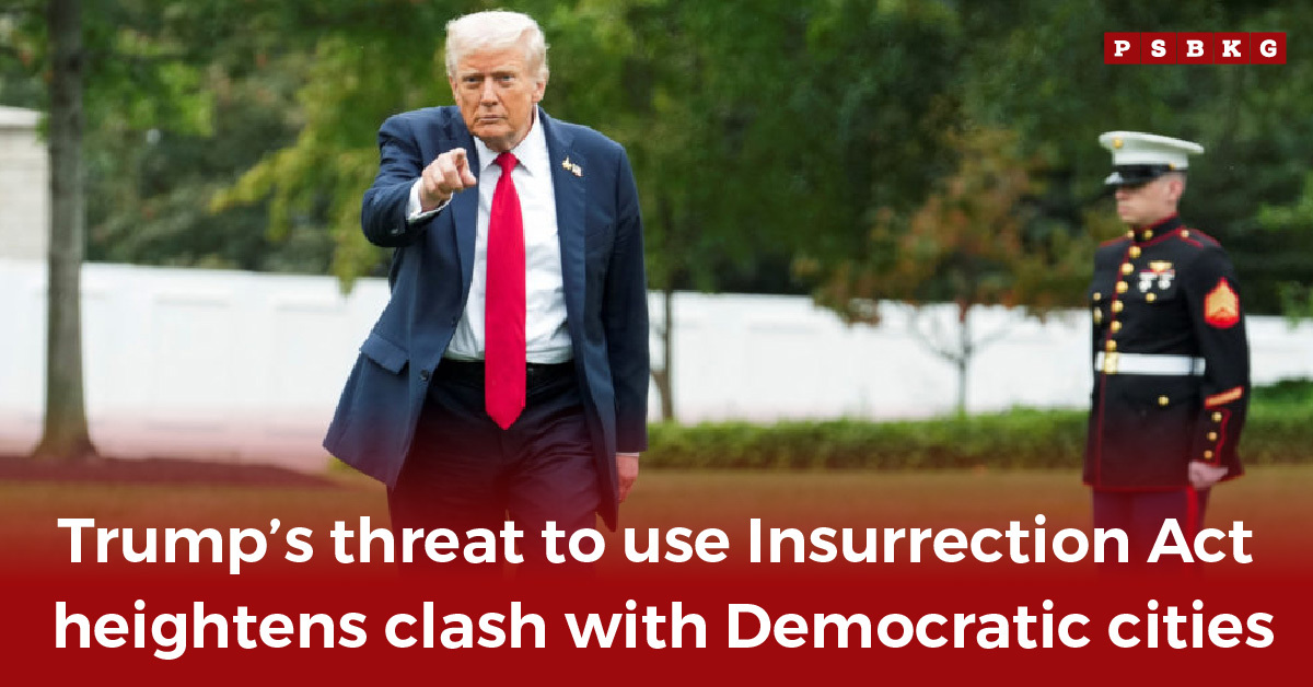 A man in a suit with a red tie walks through a garden, gesturing as a uniformed soldier stands at attention nearby illustrating Trump’s Insurrection Act controversy.