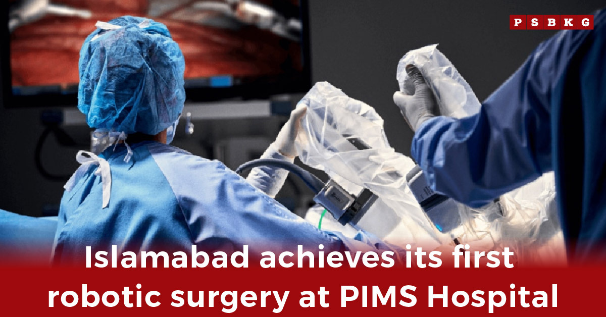 Surgeons performing Islamabad’s first robotic surgery at PIMS Hospital, with advanced equipment visible on the monitor, showcasing the progress of Islamabad robotic surgery.