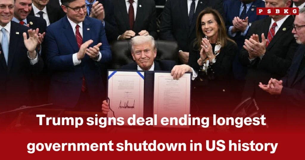 Former President Donald Trump holds signed documents while surrounded by applauding lawmakers at the White House, marking the conclusion of the longest US government shutdown in history.