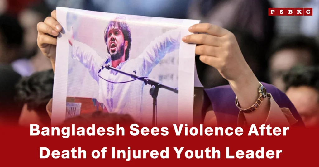 A person holds a poster of a youth leader during a rally, highlighting Bangladesh violence youth leader amid unrest following his death.