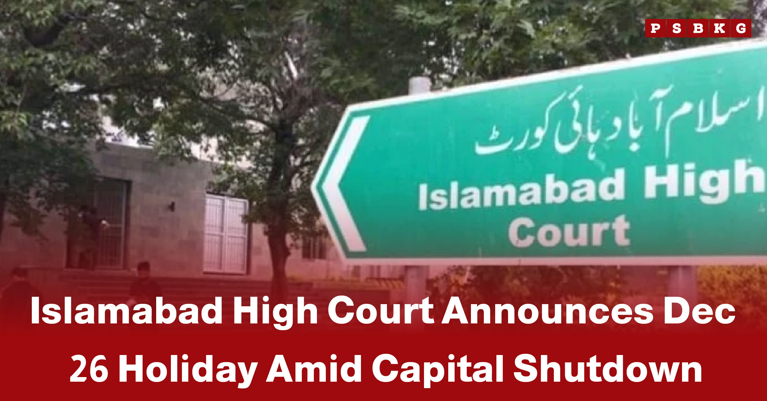 Signpost for Islamabad High Court announcing Islamabad High Court holiday on December 26 amid a capital shutdown, surrounded by greenery.