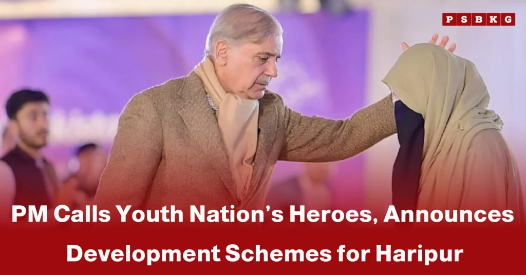 A leader gestures warmly towards a woman in a headscarf during an event highlighting PM youth development Haripur schemes.