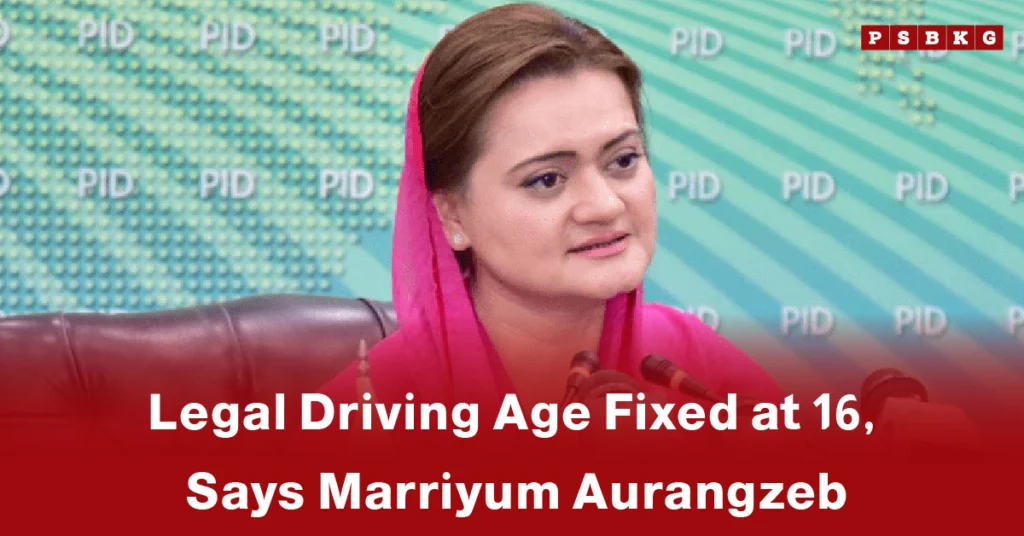 A woman in a pink outfit speaks at a podium in Pakistan, announcing the legal driving age Pakistan is set at 16 years, with a patterned background.