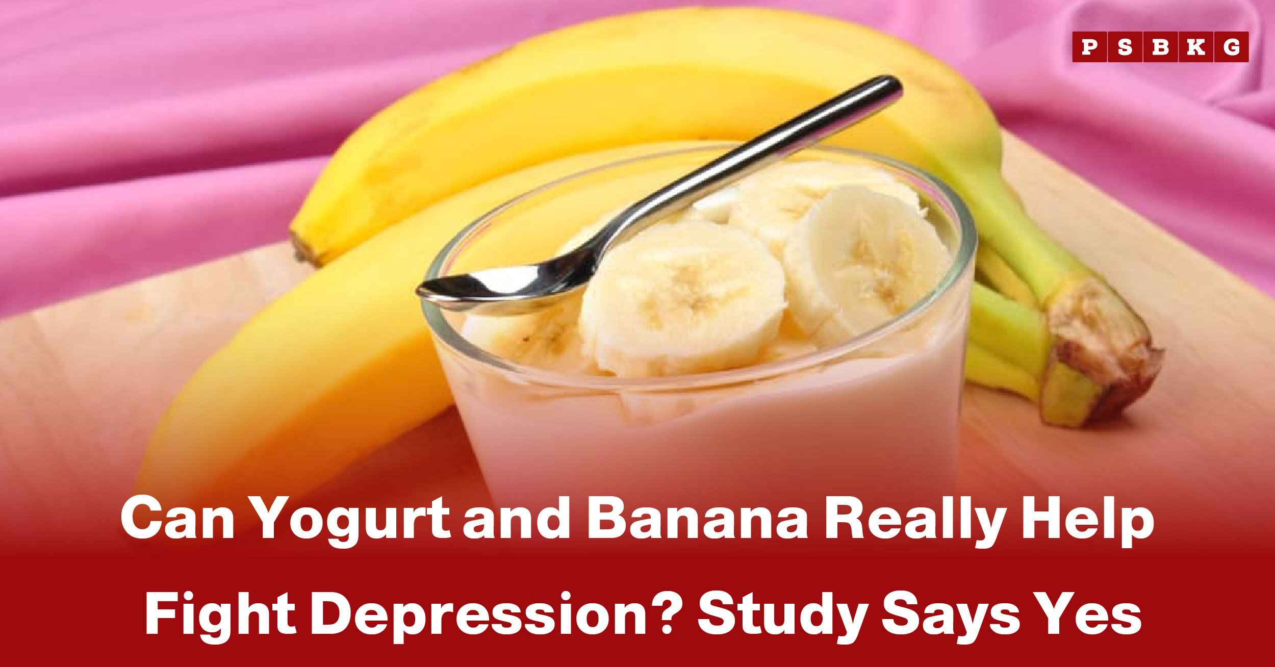A bowl of yogurt topped with banana slices, with whole bananas in the background, highlighting yogurt and banana fight depression benefits.
