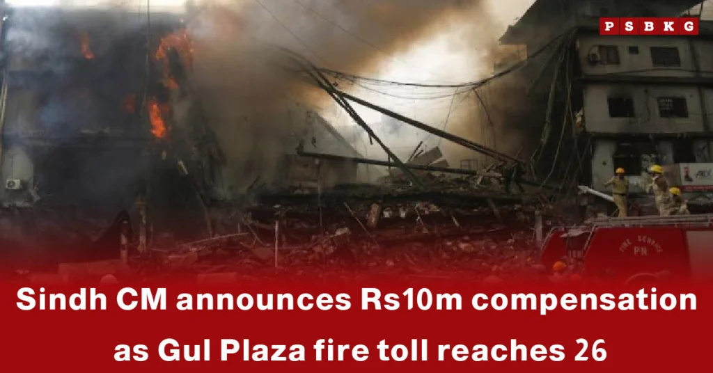 A burnt building at Gul Plaza in Karachi with smoke rising, as firefighters respond amid debris, highlighting the Gul Plaza fire Karachi with a death toll of 26.