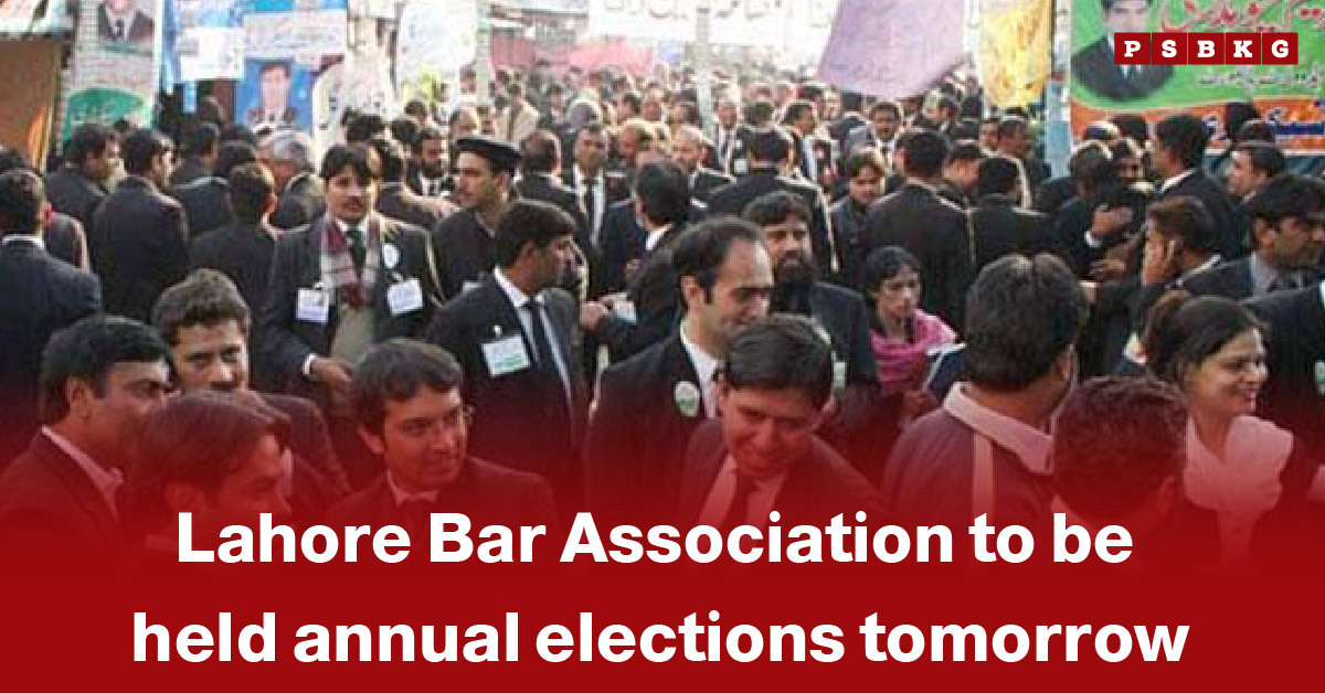 A crowd of individuals in formal attire gathers for the Lahore Bar Association elections event.