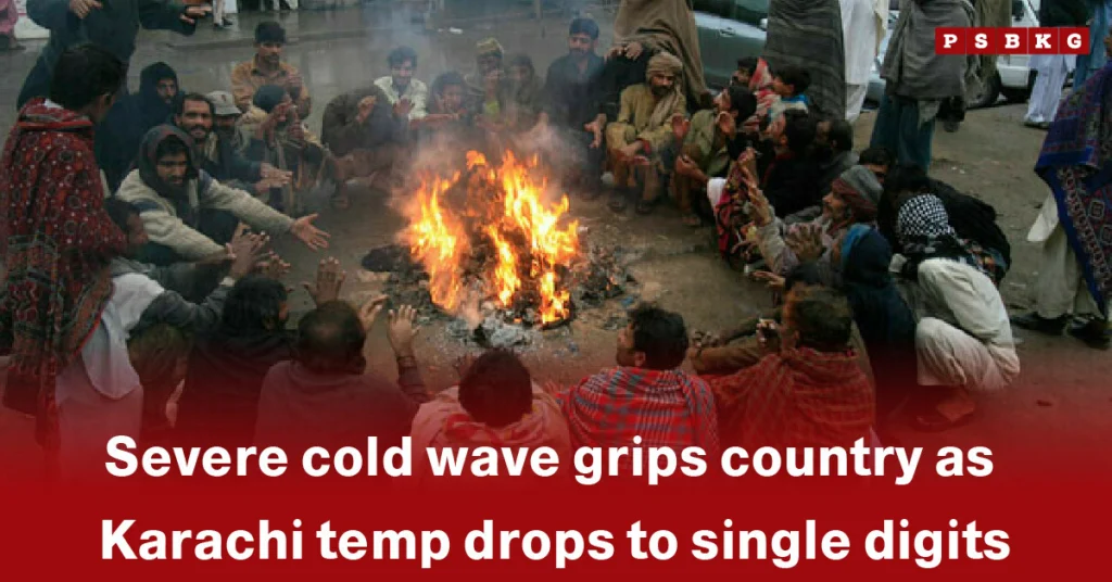A group of people gathers around a fire in Karachi, wearing warm clothing during a severe cold wave in Pakistan.