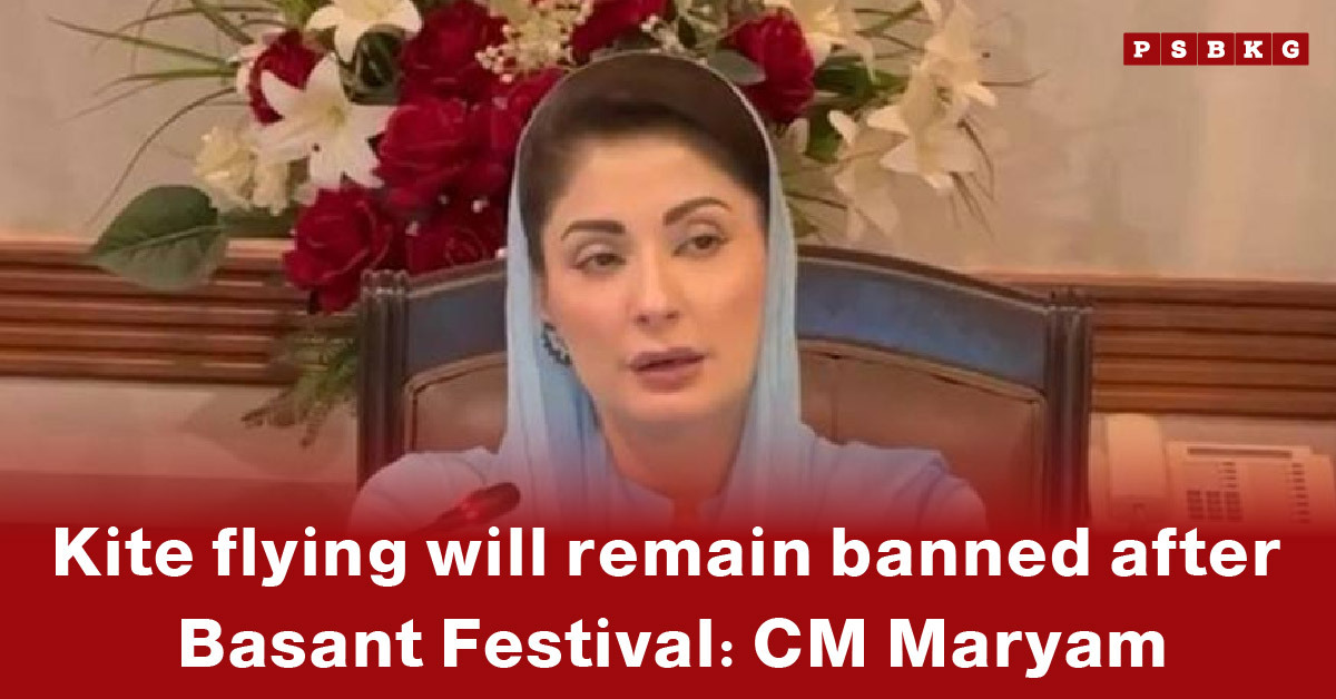 A seated official announces that kite flying will remain banned after the Basant Festival, with a backdrop of flowers, highlighting kite flying ban after Basant.