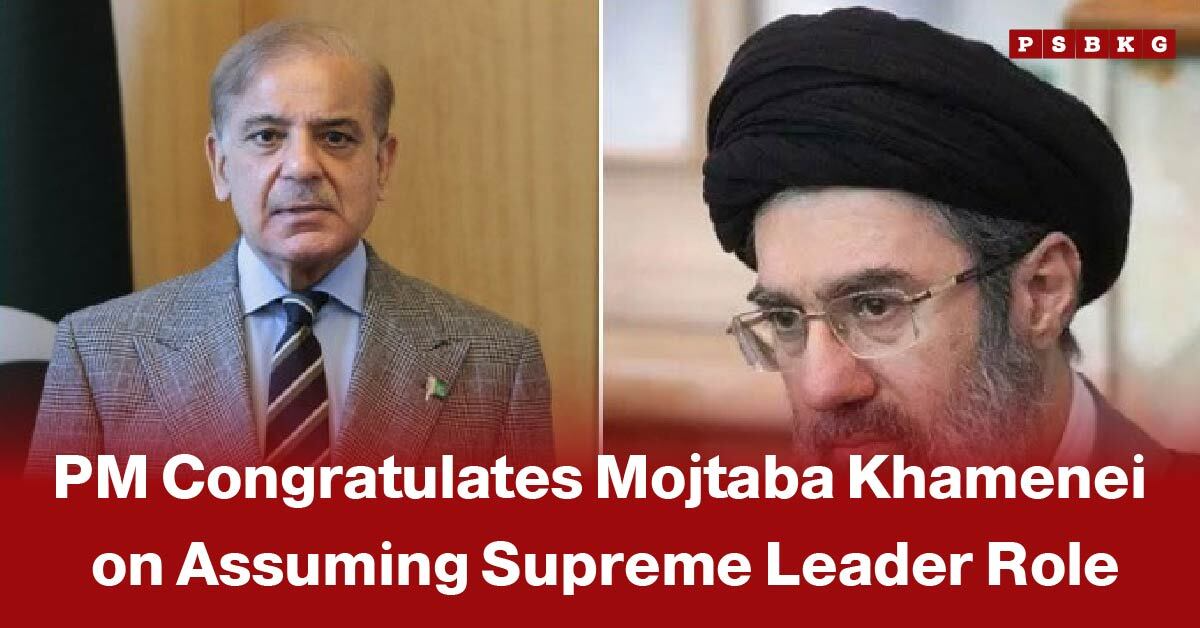 Two men, one in formal attire and the other in traditional clerical headwear, as the crowd acknowledges Mojtaba Khamenei new Supreme Leader of Iran following his election by the Assembly of Experts.