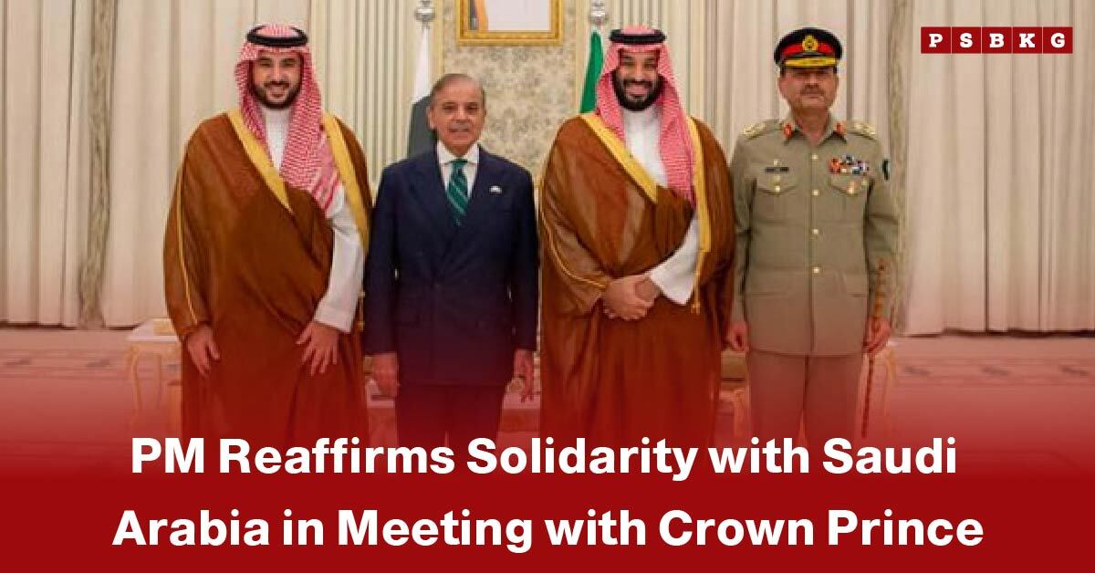 Four men standing indoors, including two in traditional Saudi attire, one in a dark suit, and one in military uniform, highlighting Pakistan Saudi Arabia relations.