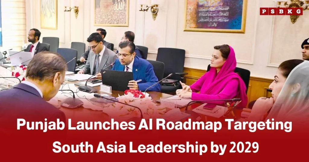 A group of people in a formal meeting, with a man in a blue suit speaking and a woman in bright pink listening, illustrating Punjab AI roadmap 2029 aiming to lead South Asia in artificial intelligence by 2029.