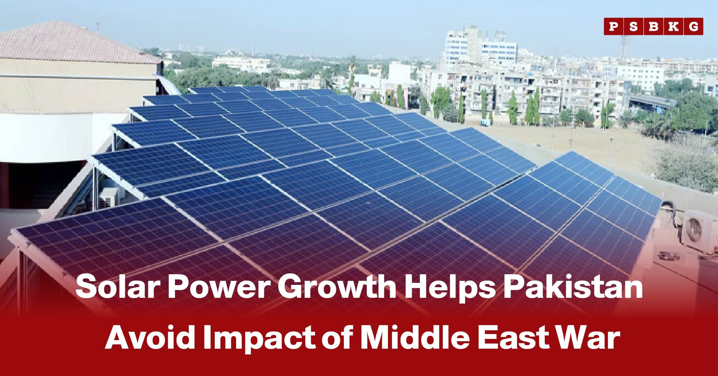 Solar panels installed on a rooftop with an urban cityscape in the background, highlighting Solar Power Pakistan and the country’s growing shift toward renewable energy.