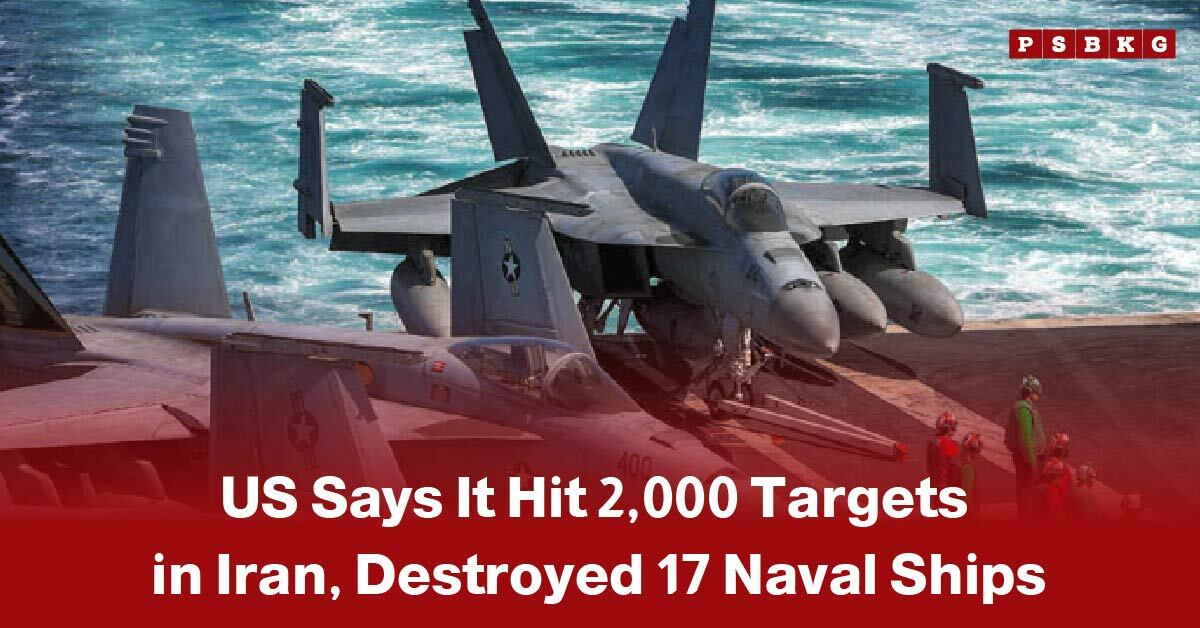 US hits 2000 targets in Iran: U.S. military jets on an aircraft carrier with ocean in the background, accompanied by crew members, highlighting extensive strikes against nearly 2,000 targets in Iran during the ongoing conflict.