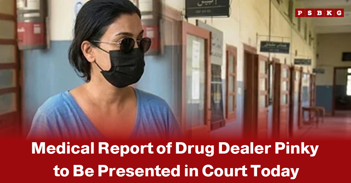 Pinky medical report court today person with blurred face standing in a corridor with blue walls and open doors, overlaid with text about a drug dealer’s medical report being presented in court today.