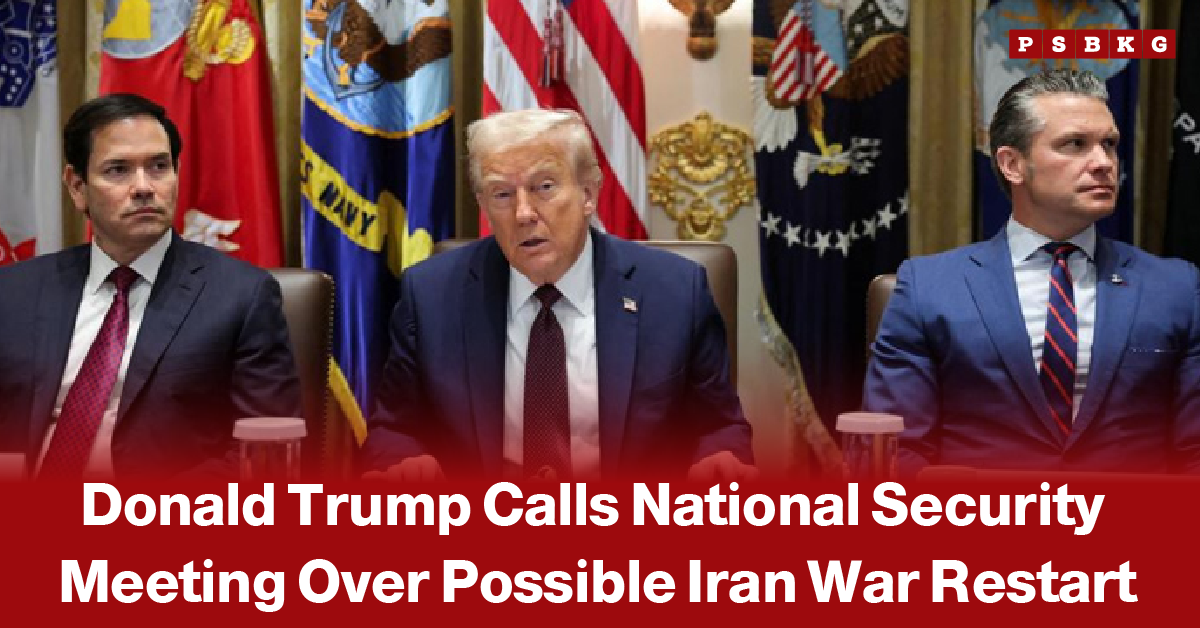 Trump national security meeting Iran war restart – three men in suits seated at a table with U.S. military and presidential flags in the background during a national security meeting on possible Iran war escalation.
