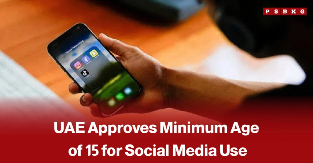 Person holding a smartphone showing social media apps on the screen, with an overlaid news-style text about the UAE approving a minimum age of 15 for social media use.