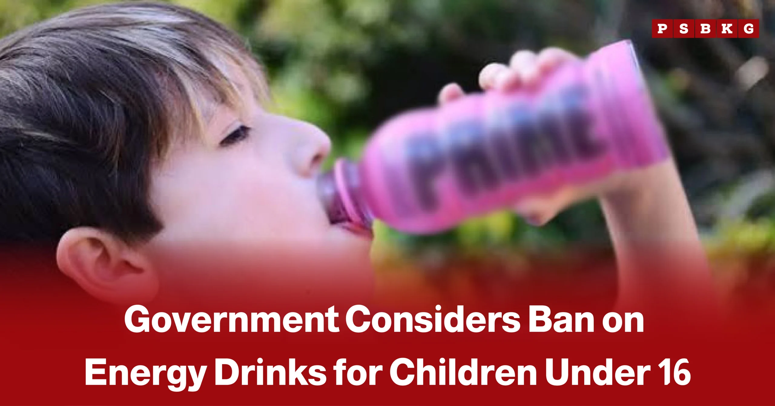 Child drinking from a bottle of energy drink, accompanied by a news-style headline about the government's consideration of banning energy drinks for children under the age of 16 due to health concerns.