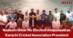 Group of officials posing during a Karachi Cricket Association meeting, accompanied by a news-style headline announcing Nadeem Omar’s unopposed re-election as President of the Karachi Cricket Association.